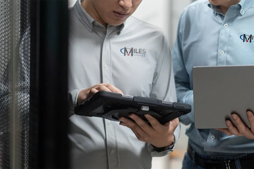Miles IT specialist supporting a client office