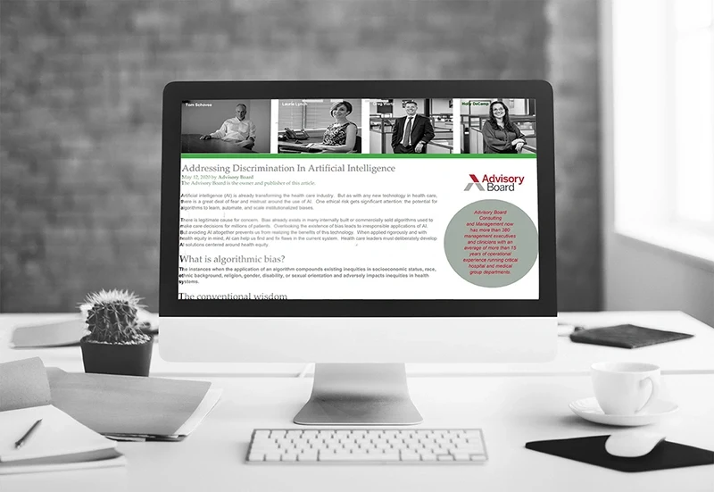 Desktop monitor displaying an MBMS newsletter