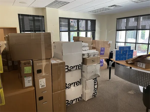 Office space with boxes of all equipment