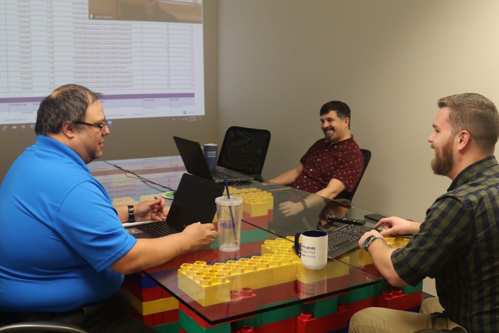 IT Team gathered in a conference room to discuss ideas