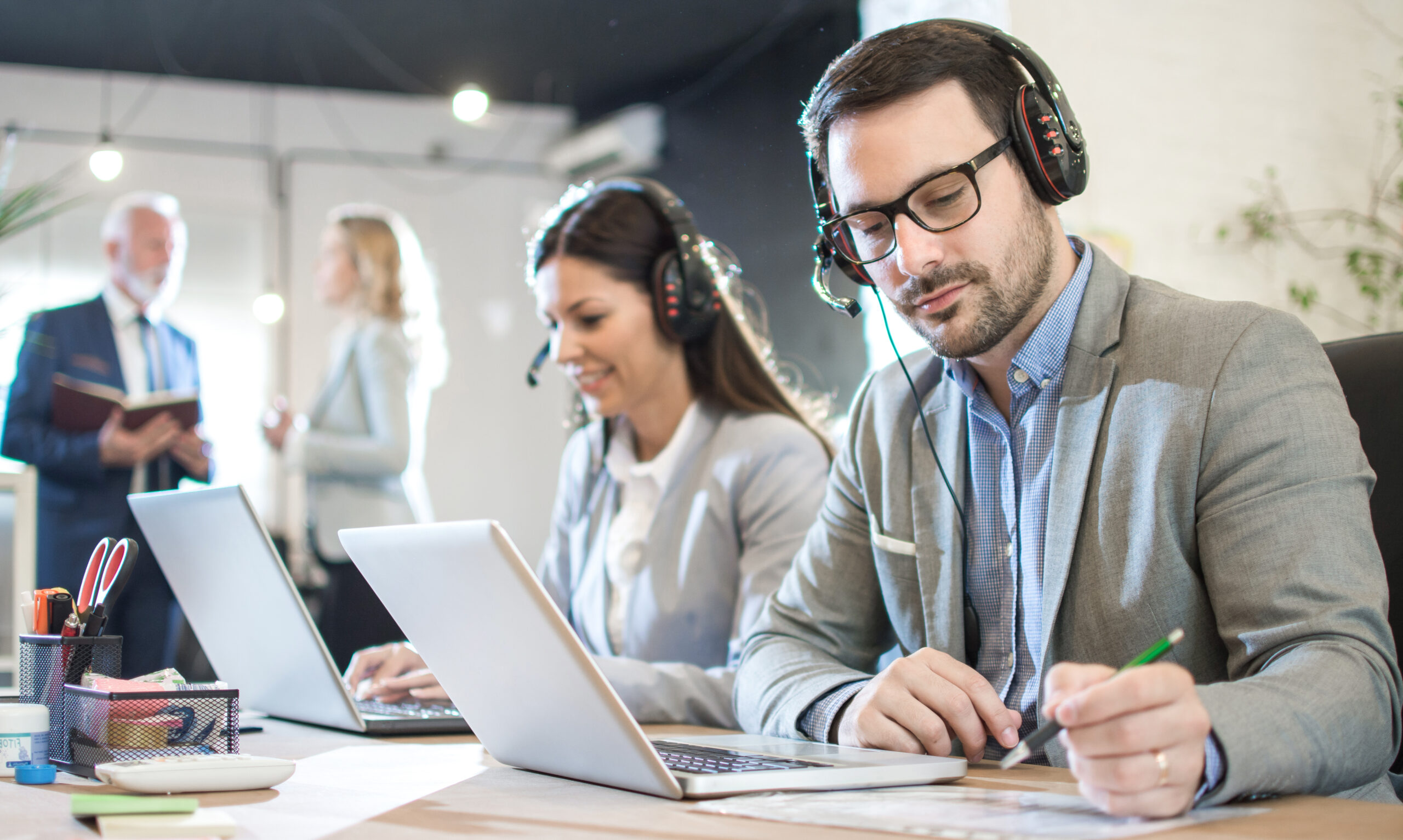 Customer Service Executive Doing Some Paperwork At Office