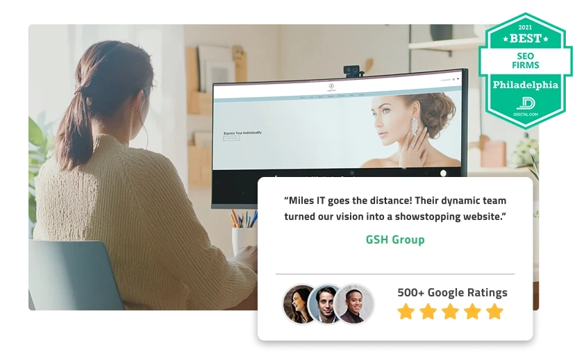 Woman looking at a custom website. Best SEO Firms Philadelphia badge and Miles IT Google reviews.