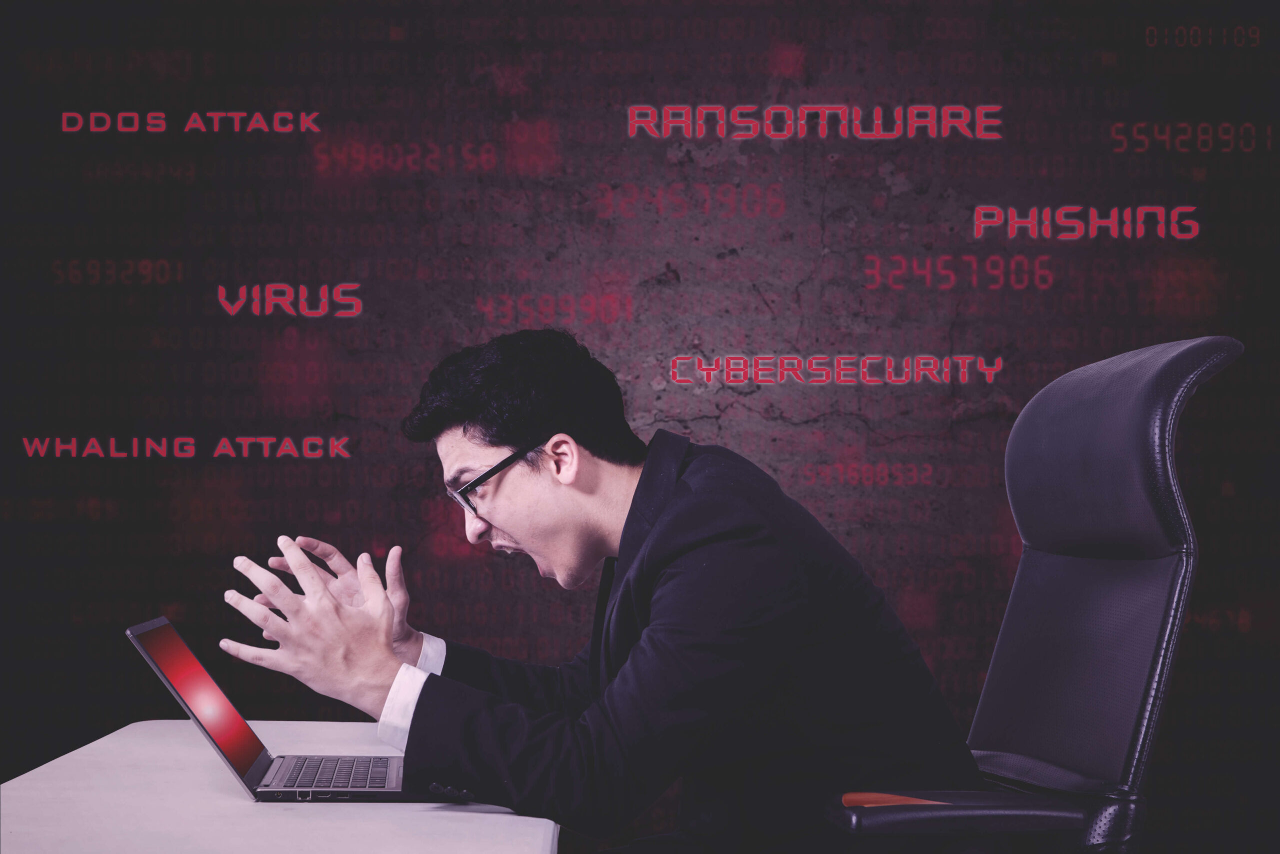 stressful CEO screaming on a damaged laptop with no cyber security