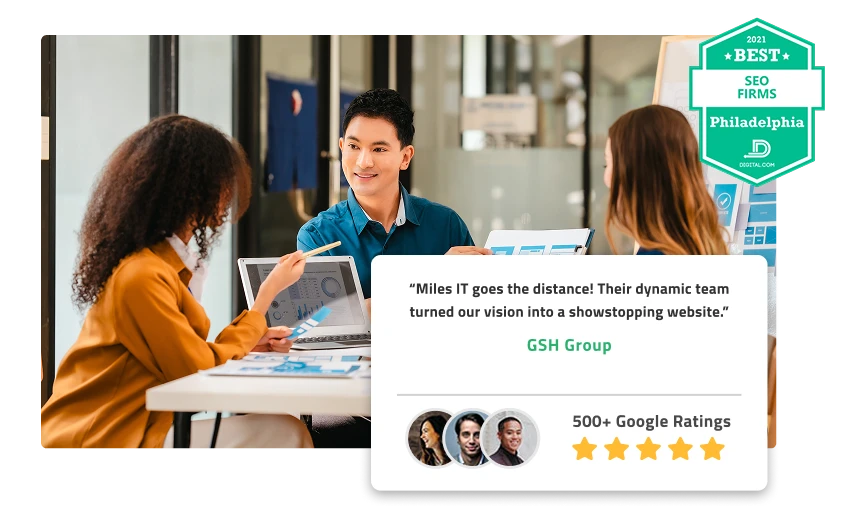 Team working on a new website design. Best SEO Firms Philadelphia badge and Miles IT Google reviews.